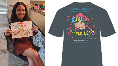 Young girl shows off t-shirt design