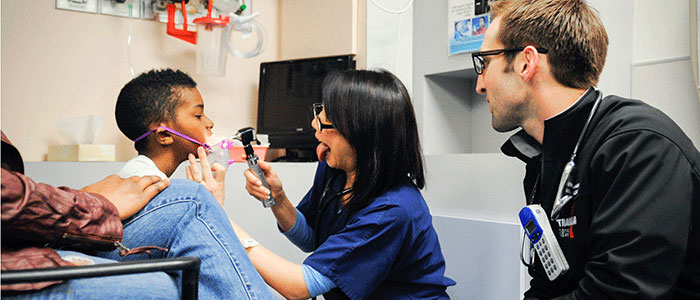 health professionals helping a child 