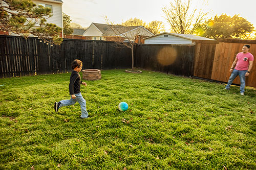 Little boy kicking the soccer ball