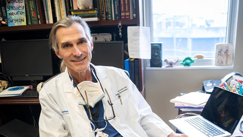 Dr. Dale Swift, pediatric neurosurgeon at Children's Health, is in his office.