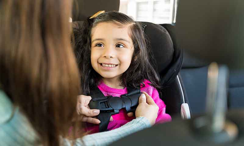 Child in their car seat