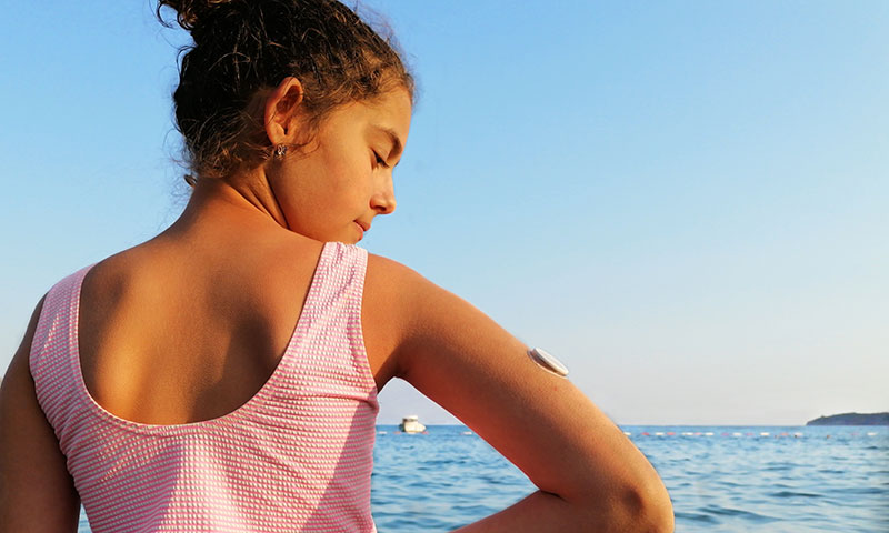 Young girl overlooking the ocean.