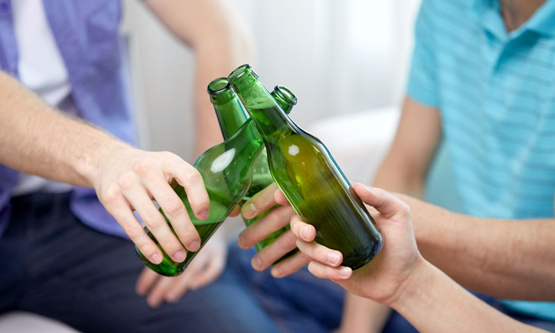 teens with beer bottles