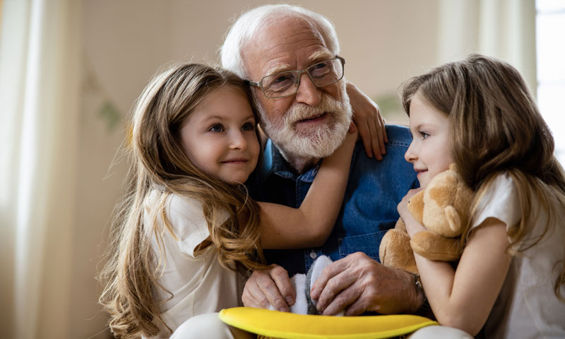 Grandfather with his granddaughters