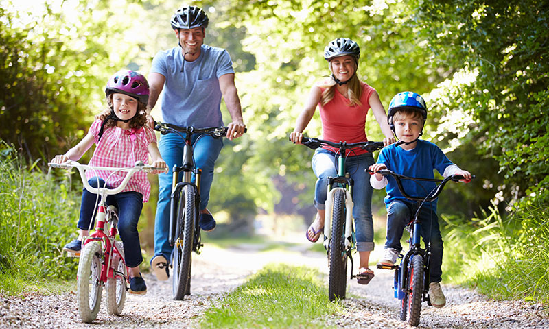 Family riding their bikes
