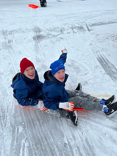 Jack and Luke on a sled