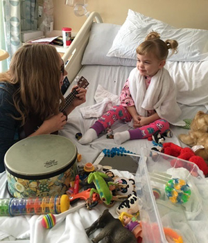 Camilla with a Children's Health Music therapist