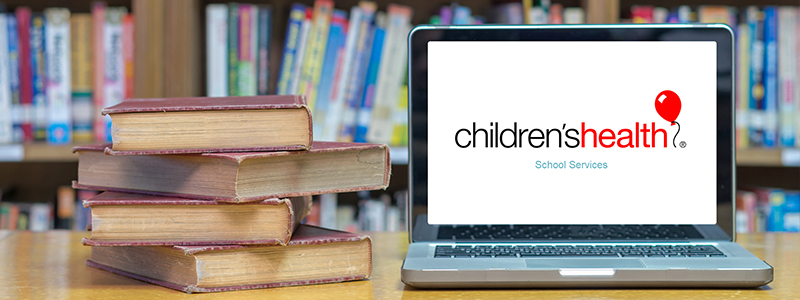 Books and laptop with Children's Health School Services