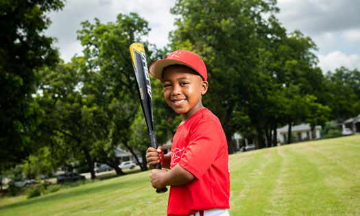 Noah in baseball uniform